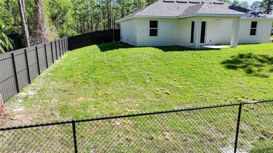 BRAND NEW CONSTRUCTION ON A 1/2 Acre Lot With A Fenced-In Back on Lehigh Resort Club in Florida - for sale on GolfHomes.com, golf home, golf lot