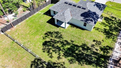 BRAND NEW CONSTRUCTION ON A 1/2 Acre Lot With A Fenced-In Back on Lehigh Resort Club in Florida - for sale on GolfHomes.com, golf home, golf lot