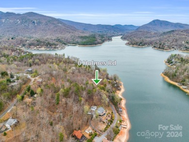 Stunning 180 degree views of mountains and lake can be had with on Lake Lure Municipal Golf Course in North Carolina - for sale on GolfHomes.com, golf home, golf lot