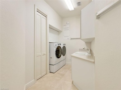 Designed for how people truly live, this striking Kensington on Kensington Golf and Country Club in Florida - for sale on GolfHomes.com, golf home, golf lot