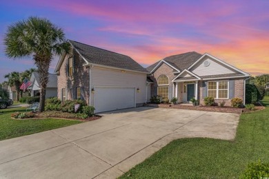 This is an immaculate 4-bedroom, 3-bathroom home in the on Heron Point Golf Club in South Carolina - for sale on GolfHomes.com, golf home, golf lot