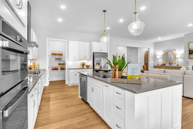 The Brandt by Stanley Martin combines smart design with everyday on Falls Village Golf Course in North Carolina - for sale on GolfHomes.com, golf home, golf lot