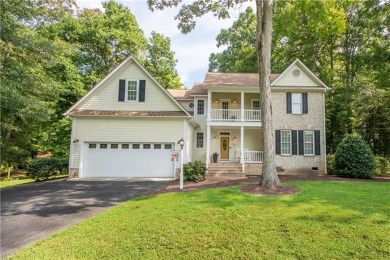 This exquisite 3,000+ square foot residence offers luxury and on Piankatank River Golf Club in Virginia - for sale on GolfHomes.com, golf home, golf lot