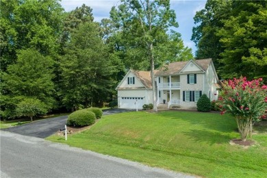 This exquisite 3,000+ square foot residence offers luxury and on Piankatank River Golf Club in Virginia - for sale on GolfHomes.com, golf home, golf lot