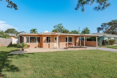 Turnkey Dunedin retreat, fully renovated from top to bottom with on The Dunedin Country Club in Florida - for sale on GolfHomes.com, golf home, golf lot