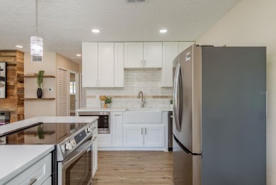 Turnkey Dunedin retreat, fully renovated from top to bottom with on The Dunedin Country Club in Florida - for sale on GolfHomes.com, golf home, golf lot