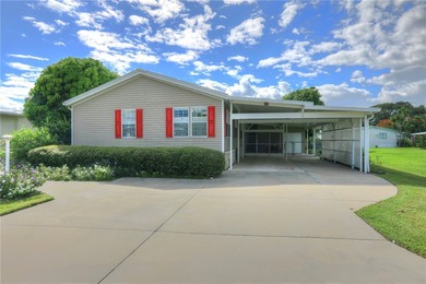 Fruit Trees, Sunshine & Freedom-it's all here on a fenced lot on Barefoot Bay Golf Course in Florida - for sale on GolfHomes.com, golf home, golf lot