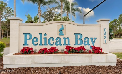 This beautifully updated 4-bedroom, 2-bathroom home in the on The Club At Pelican Bay - North Course in Florida - for sale on GolfHomes.com, golf home, golf lot