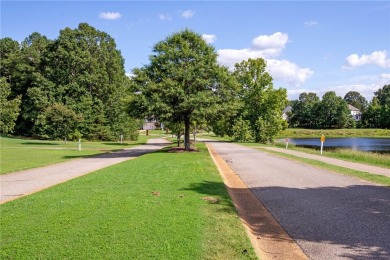 Great opportunity to own this meticulously maintained golf front on Williamsburg National Golf Club in Virginia - for sale on GolfHomes.com, golf home, golf lot