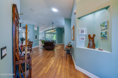 This beautifully updated 4-bedroom, 2-bathroom home in the on The Club At Pelican Bay - North Course in Florida - for sale on GolfHomes.com, golf home, golf lot