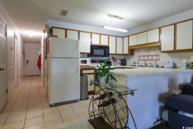 Don't miss out on this 1st floor open concept unit that has a on Island Green Golf Club in South Carolina - for sale on GolfHomes.com, golf home, golf lot