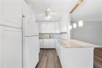 Welcome to this beautifully updated first-floor villa in the on Kings Point Golf -Flanders Way in Florida - for sale on GolfHomes.com, golf home, golf lot