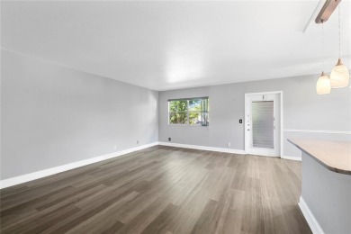Welcome to this beautifully updated first-floor villa in the on Kings Point Golf -Flanders Way in Florida - for sale on GolfHomes.com, golf home, golf lot