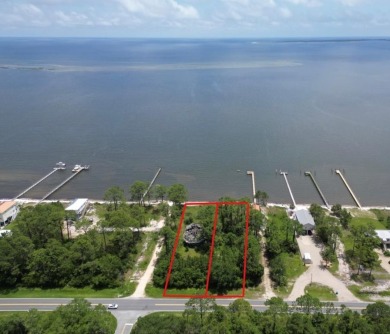 The bay front lot measures approximately 400 feet deep and on St. James Bay in Florida - for sale on GolfHomes.com, golf home, golf lot