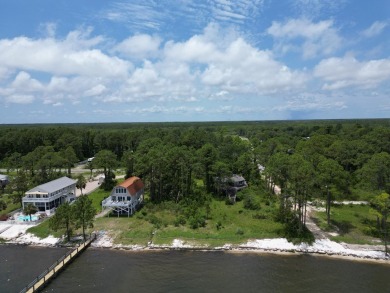 The bay front lot measures approximately 400 feet deep and on St. James Bay in Florida - for sale on GolfHomes.com, golf home, golf lot