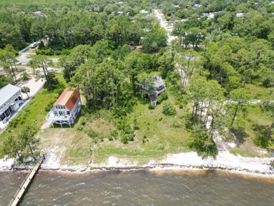 The bay front lot measures approximately 400 feet deep and on St. James Bay in Florida - for sale on GolfHomes.com, golf home, golf lot