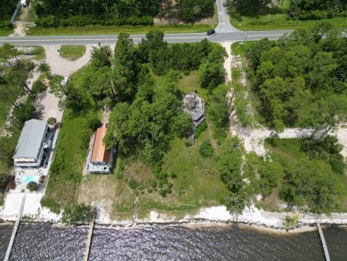 The bay front lot measures approximately 400 feet deep and on St. James Bay in Florida - for sale on GolfHomes.com, golf home, golf lot