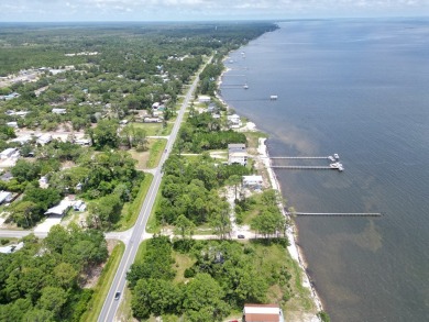 The bay front lot measures approximately 400 feet deep and on St. James Bay in Florida - for sale on GolfHomes.com, golf home, golf lot