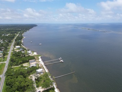 The bay front lot measures approximately 400 feet deep and on St. James Bay in Florida - for sale on GolfHomes.com, golf home, golf lot