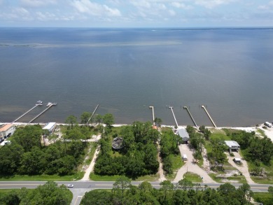 The bay front lot measures approximately 400 feet deep and on St. James Bay in Florida - for sale on GolfHomes.com, golf home, golf lot