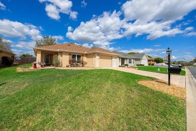 Located in Spruce Creek Golf & Country Club, this beautifully on Eagle Ridge At Spruce Creek Country Club in Florida - for sale on GolfHomes.com, golf home, golf lot