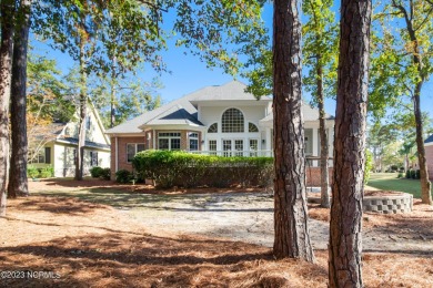 This stately home sits on a .53-acre lot within Ocean Ridge on Tigers Eye Golf Links in North Carolina - for sale on GolfHomes.com, golf home, golf lot