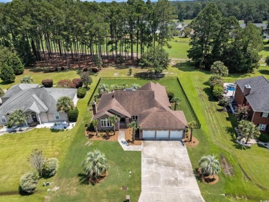 Welcome to this stunning 4-bedroom, 3-bath all-brick home on Myrtle Beach National Golf Course in South Carolina - for sale on GolfHomes.com, golf home, golf lot