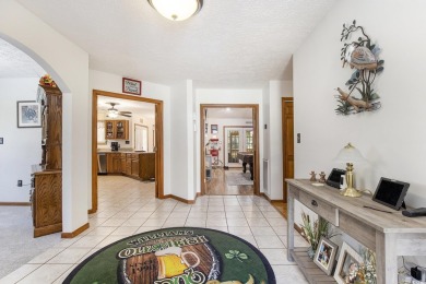 Welcome to this stunning 4-bedroom, 3-bath all-brick home on Myrtle Beach National Golf Course in South Carolina - for sale on GolfHomes.com, golf home, golf lot