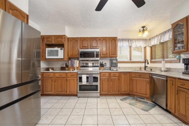 Welcome to this stunning 4-bedroom, 3-bath all-brick home on Myrtle Beach National Golf Course in South Carolina - for sale on GolfHomes.com, golf home, golf lot