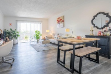 Discover the perfect blend of comfort and convenience in this on Oriole Golf and Tennis Club in Florida - for sale on GolfHomes.com, golf home, golf lot
