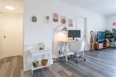 Discover the perfect blend of comfort and convenience in this on Oriole Golf and Tennis Club in Florida - for sale on GolfHomes.com, golf home, golf lot