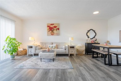 Discover the perfect blend of comfort and convenience in this on Oriole Golf and Tennis Club in Florida - for sale on GolfHomes.com, golf home, golf lot