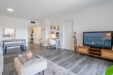 Discover the perfect blend of comfort and convenience in this on Oriole Golf and Tennis Club in Florida - for sale on GolfHomes.com, golf home, golf lot