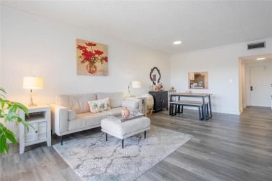 Discover the perfect blend of comfort and convenience in this on Oriole Golf and Tennis Club in Florida - for sale on GolfHomes.com, golf home, golf lot