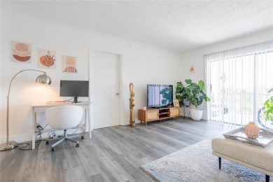Discover the perfect blend of comfort and convenience in this on Oriole Golf and Tennis Club in Florida - for sale on GolfHomes.com, golf home, golf lot