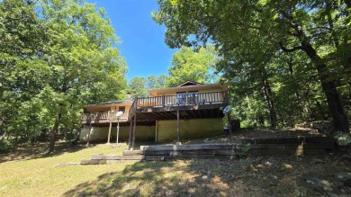 Welcome to market this Charming 3-bedroom, 2-bath home located on Indian Hills Country Club in Arkansas - for sale on GolfHomes.com, golf home, golf lot