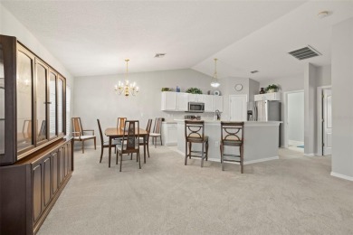 Under contract-accepting backup offers. A QUAINT MOVE-IN-READY on Tampa Bay Golf and Country Club in Florida - for sale on GolfHomes.com, golf home, golf lot