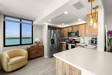 Welcome to an exquisite residence where elegance meets on Isla Del Sol Yacht and Country Club in Florida - for sale on GolfHomes.com, golf home, golf lot