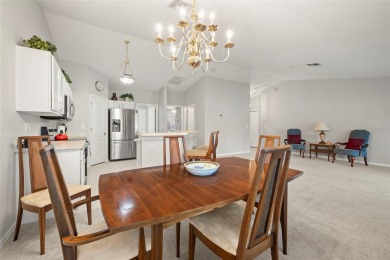Under contract-accepting backup offers. A QUAINT MOVE-IN-READY on Tampa Bay Golf and Country Club in Florida - for sale on GolfHomes.com, golf home, golf lot