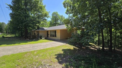 Welcome to market this Charming 3-bedroom, 2-bath home located on Indian Hills Country Club in Arkansas - for sale on GolfHomes.com, golf home, golf lot