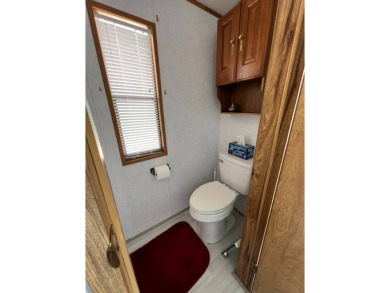 Charming 2 bed, 1.5 bath Home in 55+ Golf Community - New Roof on Lake Henry Golf Club in Florida - for sale on GolfHomes.com, golf home, golf lot