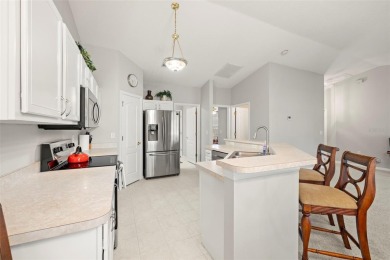 Under contract-accepting backup offers. A QUAINT MOVE-IN-READY on Tampa Bay Golf and Country Club in Florida - for sale on GolfHomes.com, golf home, golf lot