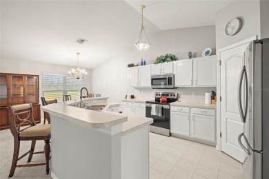 Under contract-accepting backup offers. A QUAINT MOVE-IN-READY on Tampa Bay Golf and Country Club in Florida - for sale on GolfHomes.com, golf home, golf lot