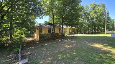Welcome to market this Charming 3-bedroom, 2-bath home located on Indian Hills Country Club in Arkansas - for sale on GolfHomes.com, golf home, golf lot