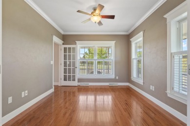 Step into timeless elegance with this stunning two-story on Dyersville Golf and Country Club in Iowa - for sale on GolfHomes.com, golf home, golf lot