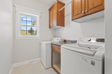 Step into timeless elegance with this stunning two-story on Dyersville Golf and Country Club in Iowa - for sale on GolfHomes.com, golf home, golf lot