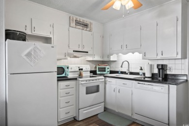 A SHORT STROLL TO THE BEACH, WATER VIEWS, METICULOUSLY on Surf Golf and Beach Club in South Carolina - for sale on GolfHomes.com, golf home, golf lot