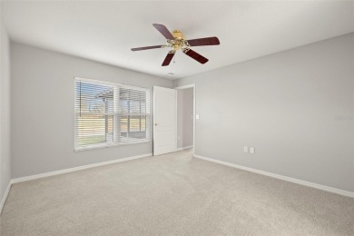 Under contract-accepting backup offers. A QUAINT MOVE-IN-READY on Tampa Bay Golf and Country Club in Florida - for sale on GolfHomes.com, golf home, golf lot