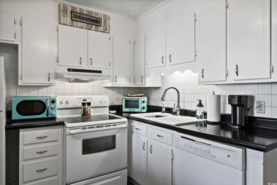 A SHORT STROLL TO THE BEACH, WATER VIEWS, METICULOUSLY on Surf Golf and Beach Club in South Carolina - for sale on GolfHomes.com, golf home, golf lot