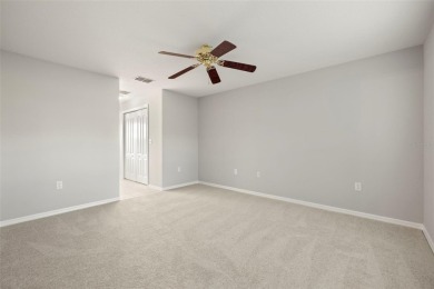 Under contract-accepting backup offers. A QUAINT MOVE-IN-READY on Tampa Bay Golf and Country Club in Florida - for sale on GolfHomes.com, golf home, golf lot
